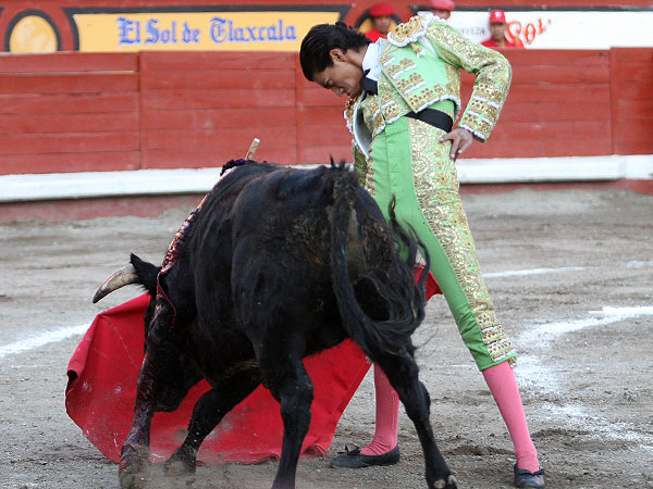 Sentado en los ri�ones