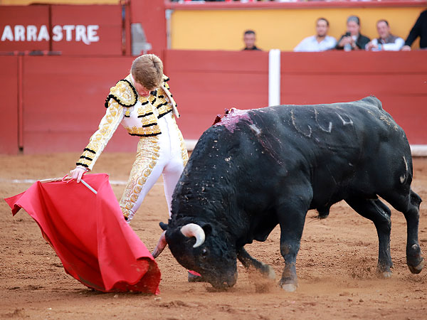 Sentado en los riones