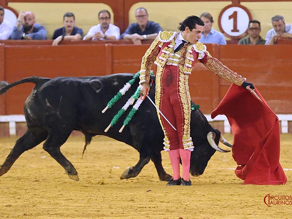 Por la espalda