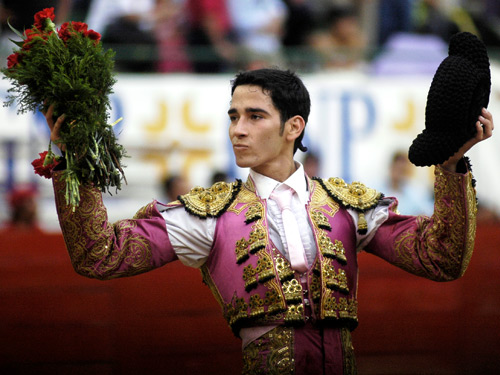 Recibiendo la ovaci�n