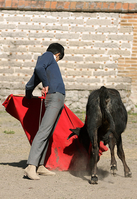 Sentado en los ri�ones