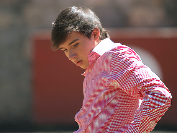 Poni�ndose delante